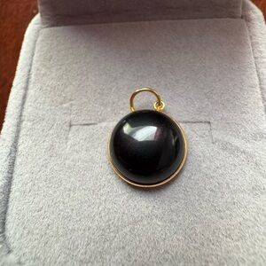 Elegant Black and Gold Pendant